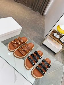 2024 Slippels Chypre Sandaal Designer Sliders slippers Flops platte sandalen voor strandcomfort kalfsleer leer natuurlijke suede geitenhuid in bruin en zwart voor vrouwen