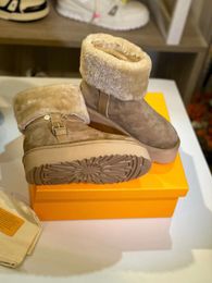 2024 Snowdrop Botas de diseñador Zapatos de mujer Botas de piel de invierno Botas de cuero cálidas Botas de nieve de piel de oveja suave Tobillo Marrón Negro Zapato peludo de lujo al aire libre 35-42