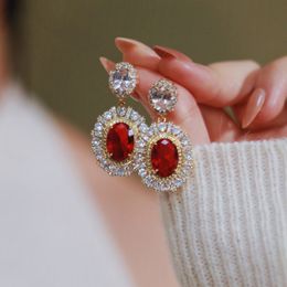 2024 Sprankelende Dangle Oorbellen Luxe Sieraden 925 Sterling Zilver Vulling Ovaal Geslepen Ruby CZ Diamant Edelstenen Partij Hof Dames Bruiloft Druppel Oorbel Cadeau