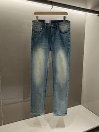 2024 Lettre de broderie d'automne de printemps Imprimé jeans pour hommes zipper lriped ight lavé pantalon crayon de l'homme wcnz095