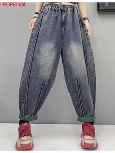 2024 lente retro etnische stijl eenvoudige kunst jeans elastische taille gesplitst dames contrasterende kleuren losse rechte harembroek 240227