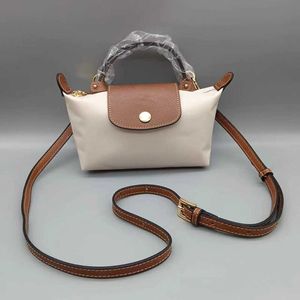2024 Store Portefeuille Clean Sacs en gros Sacs de poche Organisateur de poche Source Cowhide Zipper Hasp Mini Bage Sac Dumpling Designer Handsbags Golds Woman