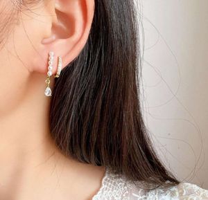 2024 Moules d'oreilles étalons Fashion Fashion Double-couche Pearl Mosquito Coil Clip Tempérament de chute d'eau simple et indolore en gros boucles d'oreilles en gros