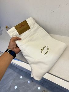 2024 Jeans de créateurs d'été de mode de poche de poche de la marque de la marque Blanche de crayon blanc jean pour hommes de haute qualité