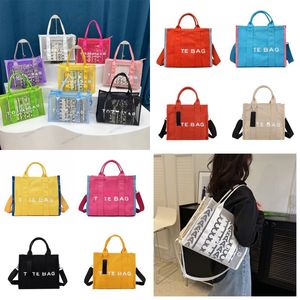 2024 Summer Marc Designer Tote bolsas para mujeres Saqueos de maleta Clear Mesh bolso Sport Beach Bolsos de playa PVC Purso Compras Crossbody Bag Bag Bags Weekender