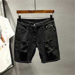 2024 Summer Ripped Hole Denim Shorts Mens Loose Fashion Fashion Elastic Male Shorts Sobreaux Baggy Bermuda D19 240429