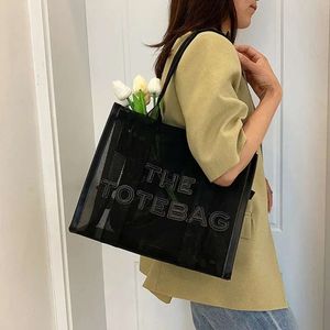 2024 Le sac fourre-tout pour femmes designer sac de luxe sacs sacs à main shopping rose transparent épaule messager plage de plage sac à main