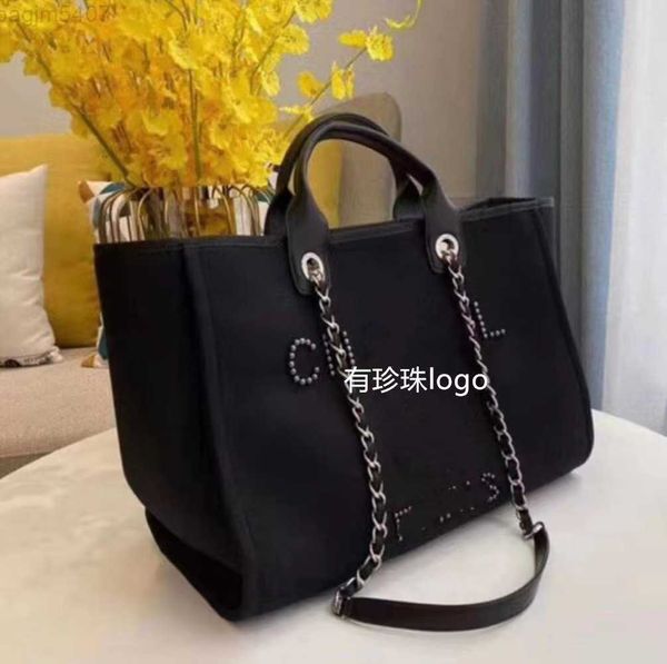 2024 Top Designer Bag Bag Luxury Fashion Hand B Jia Xiang New Women's Pearl Bordery Beach Bag Handshus