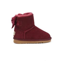 2024 Top qualité AUS U5991 Bouton court bébé garçon fille enfants bottes de neige en peau de mouton doux garder des bottes au chaud Beaux cadeaux d'anniversaire de Noël 5991GU35