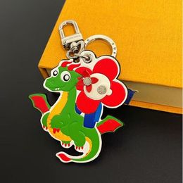 2024 Très mignon nouvel an dragon cuir dessin animé chien marque porte-clés lettre designer porte-clés sac de mode pendentif porte-clés de voiture porte-clés pour hommes femmes avec boîte-cadeau