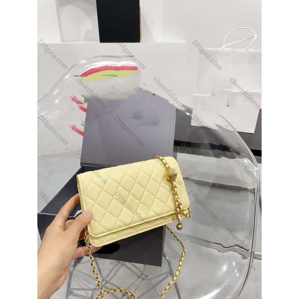 2024 Bags de bolsas Woc Bolsas para mujer Bolete de hombro para la mujer Bolso de alta calidad Bolso de alta calidad de cuero rosa Blanca Blanca Bolsa Pearl Gold Ball Diamond Wallet Bolsa de riqueza