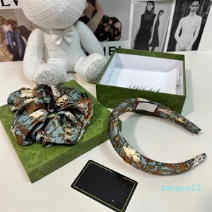 2024 femmes accessoires de créateurs femmes bande de cheveux marque lettre en métal décoration bandeau floral scrunchie ensemble polyvalent accessoires de cheveux femme bijoux