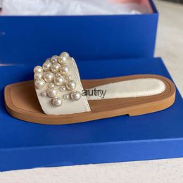 2024 Mujeres Goldie Slide Zapatillas Sandalias planas de perlas Vintage Cuadrado Toe Diseñador de cuero Zapatillas Marca Elegante Sandalia Beige Negro 5 colores de calidad superior
