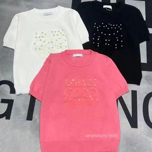 2024 Tricots pour femmes Designer début du printemps tricoté à manches courtes nouvelle manche bulle clou rouge bas pull chemisier toutes les femmes en vrac