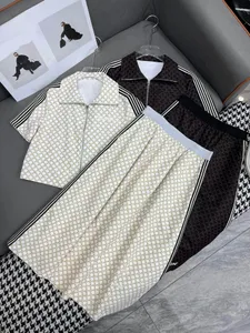 2024 Tweede stuk rok voor dames Spring Summer Fashion Women Turn Collar Zip Korte mouw jas en geprintte dame lange rok casual matching set