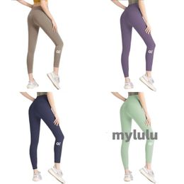 Pantalones de yoga para mujer alinean las polainas con bolsillos Traje deportivo de cintura alta Tela de lycra Pantalones inferiores de color sólido Pantalones elásticos para deportes al aire libre