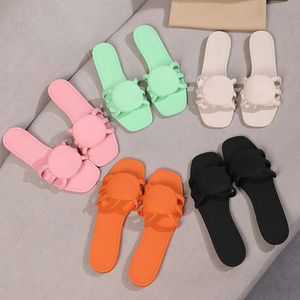 2024 Vrouwen Sandalen Designer Slippers In elkaar grijpende rubberglaasjes Sandalen Paalgroene rubbergrootte 35-41 Wit Zwarte Heren Slipper Damesglaasjes Pink Oranje voor mannenschoen