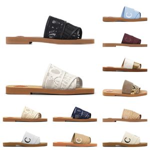 2024 vrouwen woody muilezels platte sandalen slides cloe designer canvas slippers wit zwart zeil damesmode outdoor strand slipper schoenen