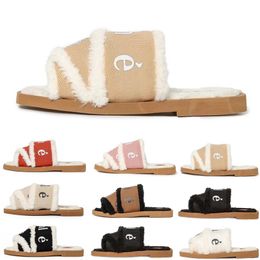 2024 Woody Mules Mujeres Diseñador Zapatillas Diapositivas Sandalias Piel Lona Shearling Moda Plana Blanco Negro Vela Mujer Playa al aire libre Pantoufle Invierno Slide Sandalia