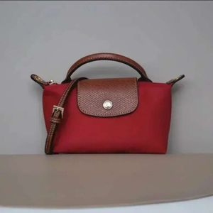 2024 Y2K Mujeres Nuevas primavera Autumn Versátil Versátil Mini Handbag Fashion Diseñador Bolso de bolsos casuales y bolsos de diseñador 10A