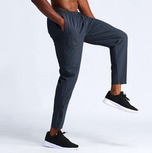 2024 Yoga LL Pantalon long de jogging pour homme Tenue de sport de yoga en plein air City-Sweat Yogo Gym Poches LL Pantalon de survêtement Pantalon décontracté Taille élastique Fitness LU Pantalon d'entraînement577