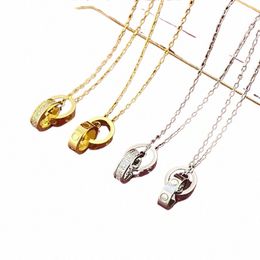 2024Choker dames ketting liefde sieraden gouden hanger dubbele ring vlek staal Jeemlery fi ovale in elkaar grijpende ringen claviculaire ketting kettingen desi o7vj#