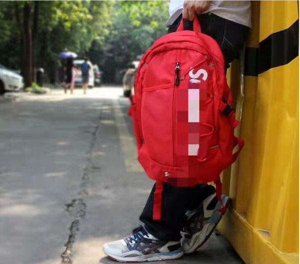 2024s Mochila para hombres y mujeres, moda juvenil, marca de marea, impresión, bolsa para estudiantes de viento universitario, gran capacidad, paquetes impermeables para exteriores