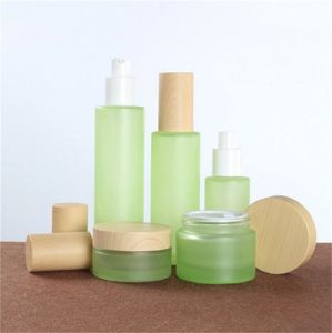 20 ml 30 ml 40 ml 60 ml 80 ml 100 ml 120 ml Bouteille en verre vert givré Pot de crème avec couvercle en bois Bouteilles à pompe de pulvérisation de lotion Récipient cosmétique rechargeable portable pour voyage