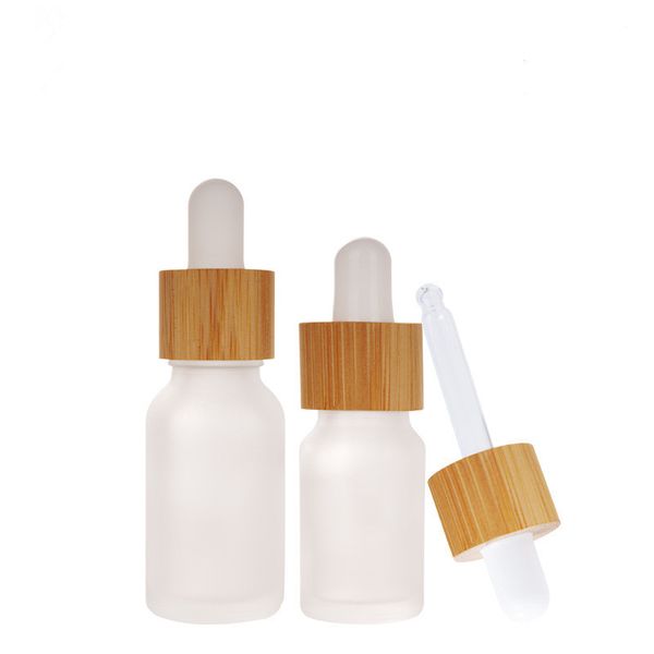 20ml 30ml 50ml 100ml Botellas cuentagotas de goma blanca transparente esmerilada con tapa de bambú Envase cosmético Botella de aceite esencial de vidrio