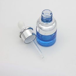 Flacon compte-gouttes en verre de luxe de 20 ml, 30 ml, bouteilles de sérum uniques bleues avec couvercle en argent spécial, prix modéré Dmqwl