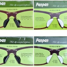 20 paires lot noir et transparent antidérapant qualité saine plaquettes nasales en gel de silice coller sur le nez pour planche lunettes de soleil lunettes anti-pression pour faire face en gros en usine