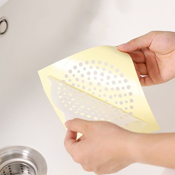 20pcs 12x12cm Desentimiento de ducha desechable Cabeza de cabello Cubierta de baño Baño Fregadero de alcantarillado Tope Bañeras de filo de malla Pegatina