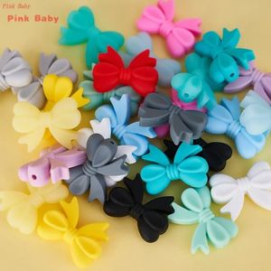 20pcs Bowknot Silicon Teether perles un nœud à nœud papillon Bébé dentition perle bricolage Chain de tétine de fabrication de jouets à croquer 240415