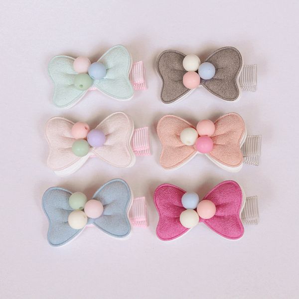 20 pcs/lot 2016 Nouvelle Arrivée Petit Arc Bébé Fille Pince À Cheveux Rose Clair Double Niveau Cheveux Arc Avec Perles Enfants Épingles À Cheveux Solide Tissu