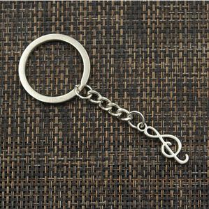 20 pcs/lot porte-clés porte-clés bijoux argent plaqué Note de musique breloques 25x9mm clé accessoires