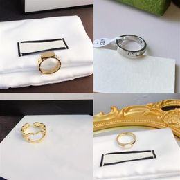 20 estilo Alta calidad Joyería de lujo Diseñador Artículo Anillos Mujeres Amor Encantos Suministros de boda Anillo de diamantes de imitación de acero inoxidable Fino 2834