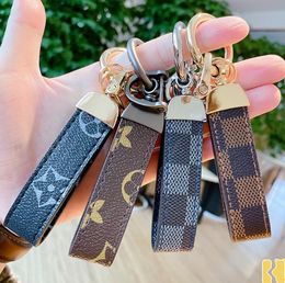 20 Estilo Luxury CAR BAJA DE CAR PISTO Joyería Flower Key Anning Homen Men Gots Fashion PU Leather Animal Key Chain Accesorios