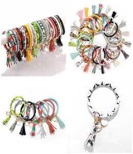 21 stijlen van creatieve PU lederen armband sleutelhanger rond stuk hanger Women039s lederen armband DHB4528549025