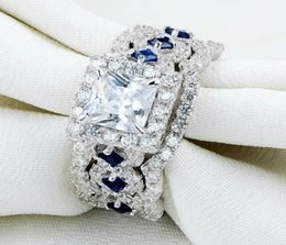 22 ct 3 pcs solide 925 Silt Silver Halo Anneaux de mariage Princess Cut CZ Blue Side Stone Bijoux classiques pour femmes6041961