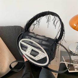 SCONTO DEL 22% Borsa di design da donna nella nuova tendenza della borsa jingle con trama rossa in denim a tracolla in denim alla moda