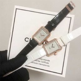 22% KORTING horloge Horloge Mode dames heren quartz uurwerk zwart witte diamant vijand bruiloft montre de luxe D319