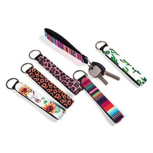 22 Stijlen Polsbandsleutellang Keychains geven de voorkeur aan bloemengedrukte sleutelhanger Neopreen Key Ring Polschain Feest Groothandel Lanyard polsband voor vrouwelijke meisjes