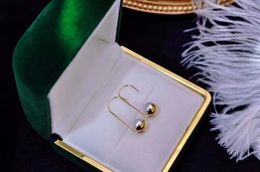 220900607 Diamondbox - Sieraden oorbellen oorstekers witte PAREL 7-8 mm akoya au750 geel goud eenvoudige haakronde hanger bedel cadeau idee stijlvol modern