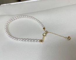 22090808 Bijoux pour femmes bracelet de perles chaîne bracelet d'eau douce au750 yellpw or réglable classique pendentif en forme de coeur