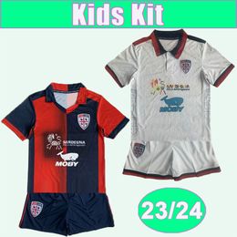 23 24 Cagliari Calcio Kid Kit Soccer Jerseys Pavoletti Mancosu Lapadula Viola Deiola Zappa Nandez Home Away Football Shirts