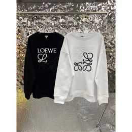 23 Otoño/Invierno Suéter nuevo Bloque de color Bordado de letras Letra versátil clásica Cuello redondo Manga larga Top informal versátil para mujer