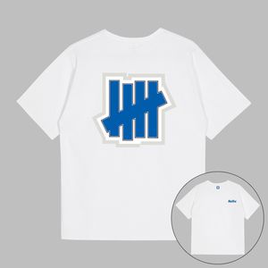 23 Ins Brand Mens Designer T-shirts UNDEFEATED Stroke Blue ICON Graphic Tee UNDFTD Japon Imprimé hommes T-shirt 100% coton Casual manches courtes surdimensionnées T-shirts S-2XL