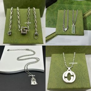 23 Bijoux de créateurs de luxe Tendance rétro Collier de créateur en argent sterling 925 Tête de tigre Pendentif fantôme rouge Lettre Étiquette Tête de crâne Pendentif Cadeau 19 styles Hommes et femmes