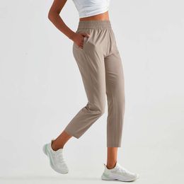23" lichtgewicht sneldrogende casual sportjoggers kuitlengte yoga crops broek dames hoge taille fiess workout joggingbroek met zakken