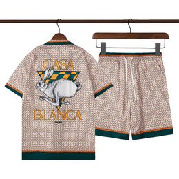 23 Moda de verano Trajes para hombre Hawaii Pantalones de playa Conjunto Camisas de diseñador Impresión Camisa de ocio Hombre Slim Fit La junta directiva Manga corta Playas cortas 052